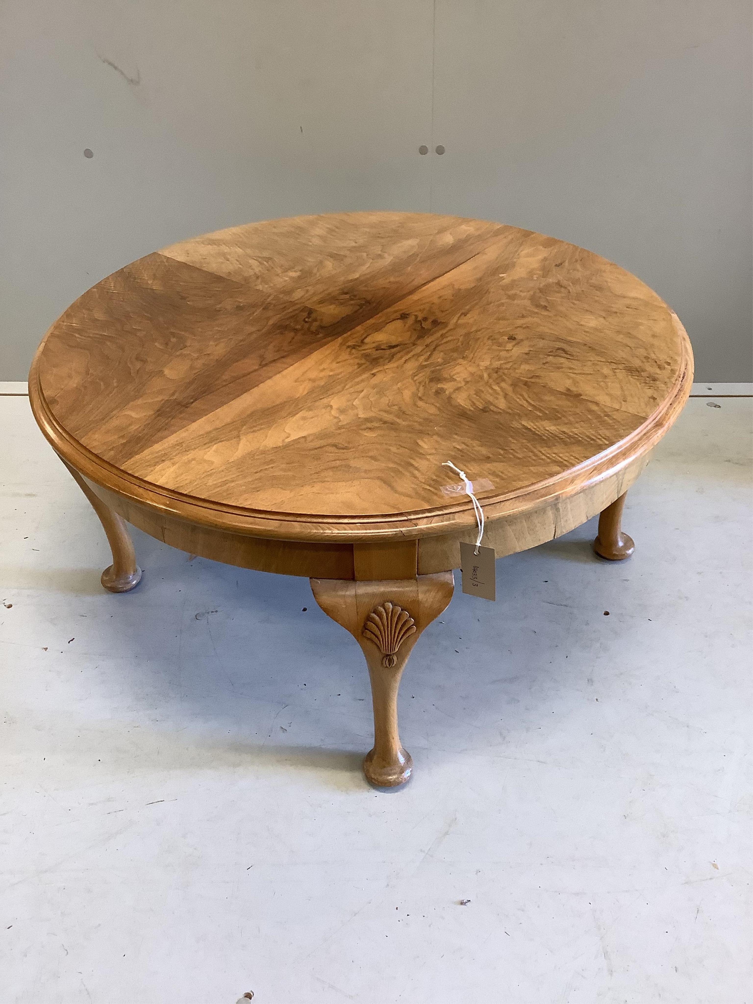 A Queen Anne revival walnut circular coffee table, diameter 80cm, height 40cm